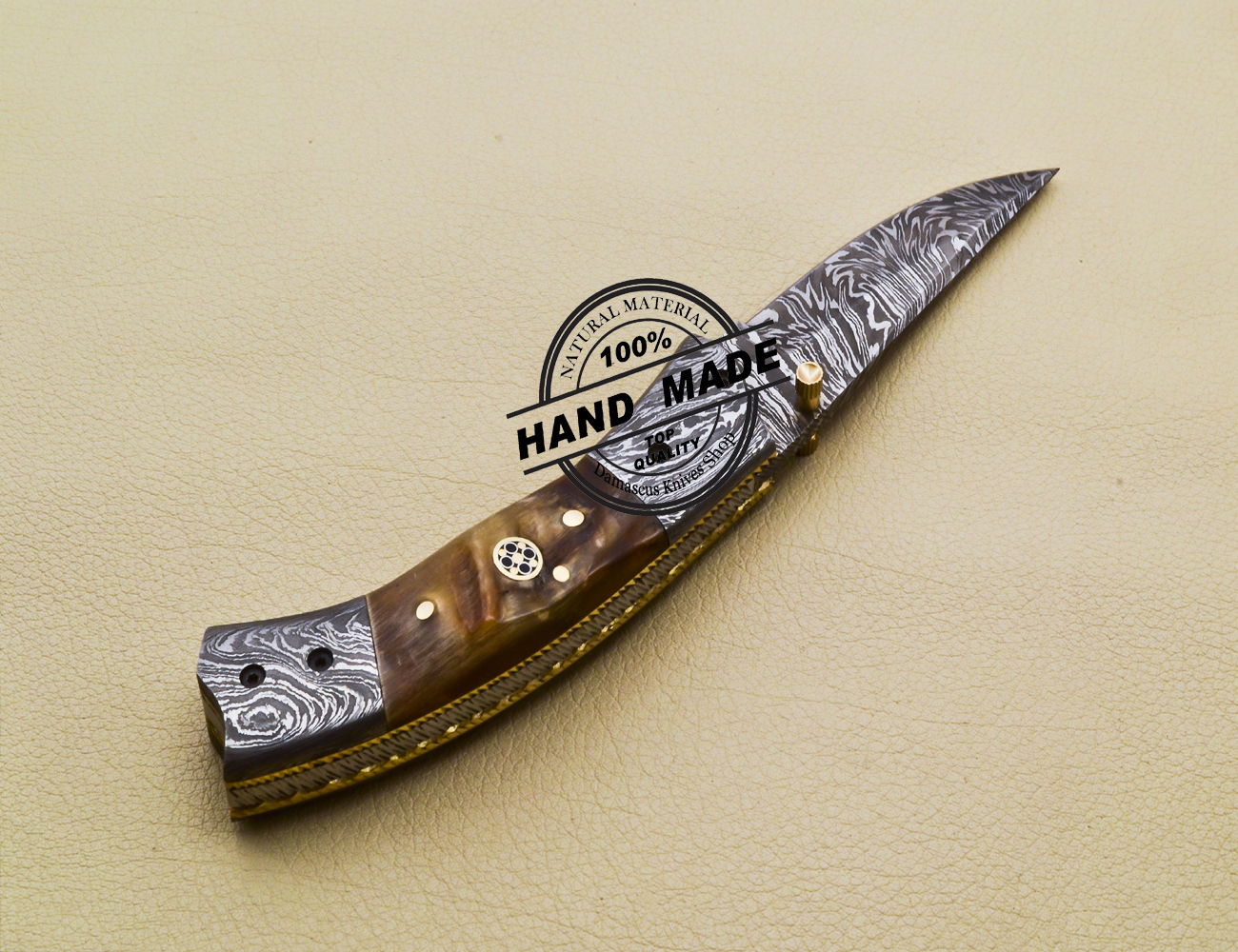 https://www.damascusknivesshop.com/wp-content/uploads/2019/12/Damascus-Folding-Knife-03.jpg